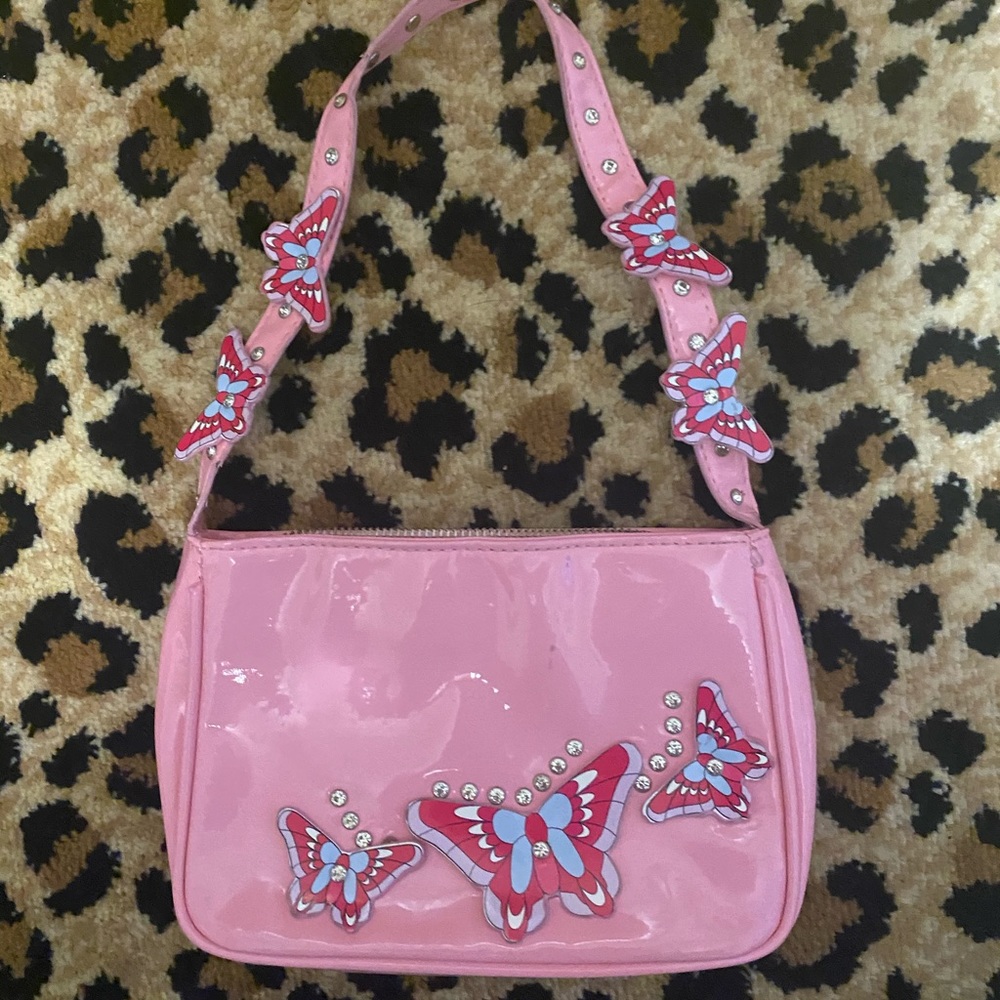 dolls kill butterfly pink purse